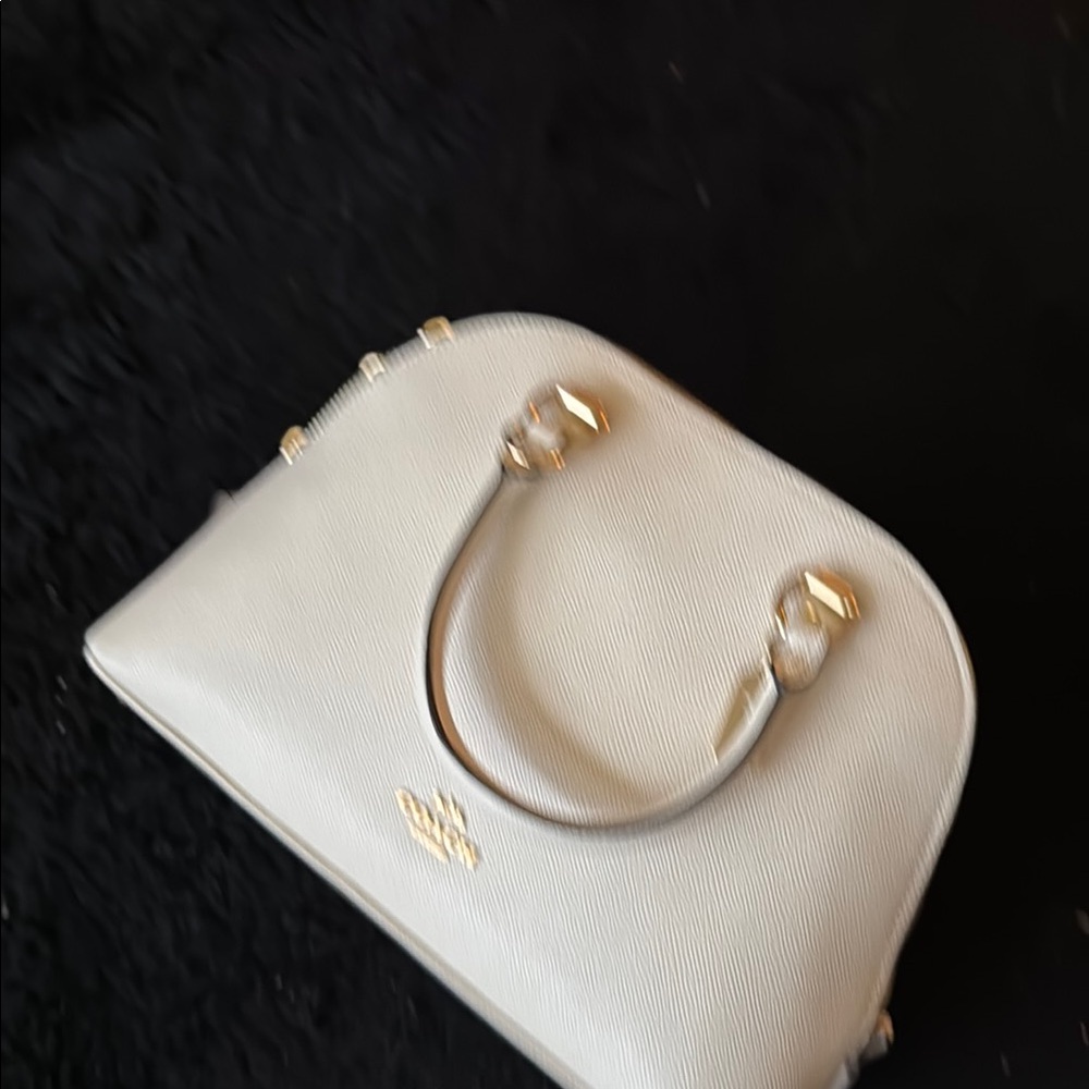 Elegant Cream Handbag